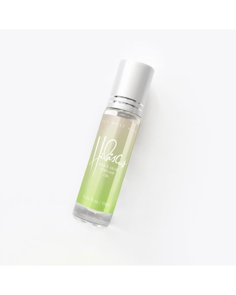 Clear travel size glass rollerball bottle of Hibiscus White Musk Perfume Oil with a silver cap. The label is a gradient of green shades and the bottle leans slightly to the right.